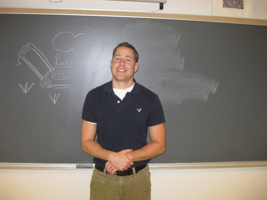 Michael Martell looks right at home in his classroom.