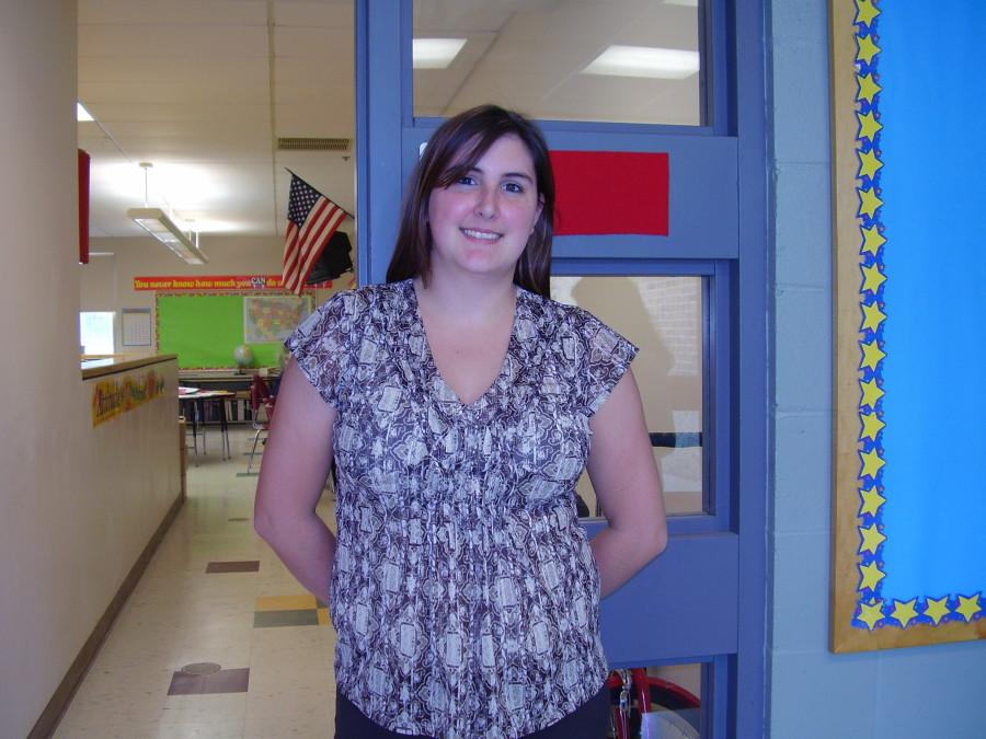 Sarah Crocker, a Special Education teacher at Westford Acadmey poses in front of her classroom. Photo by: Karen Mathew