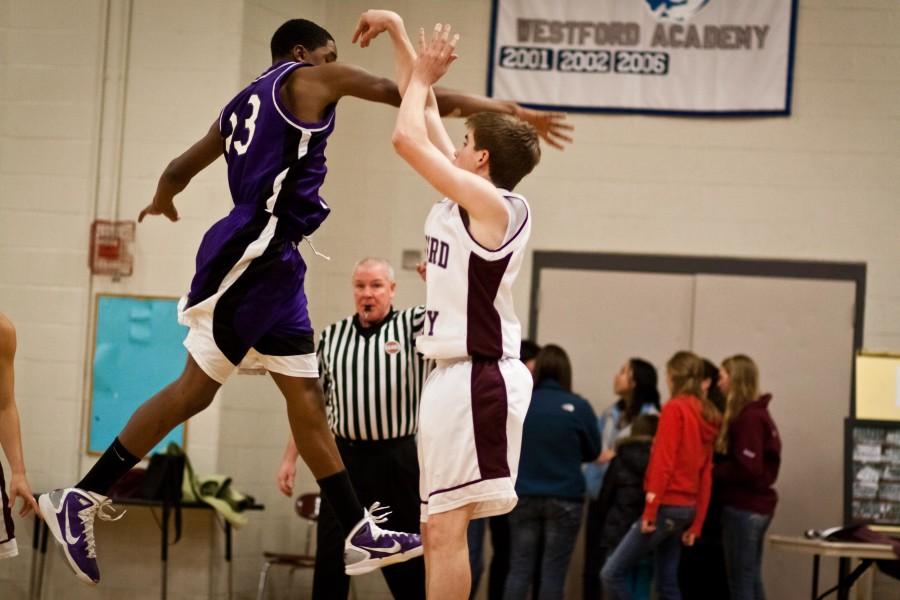 Boy’s Varsity Basketball Secures win over Boston Latin