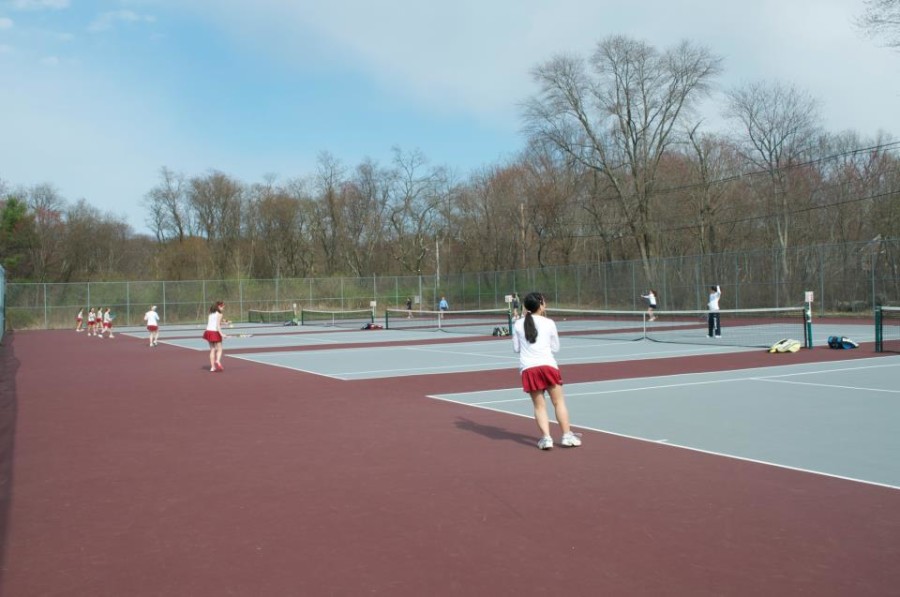 The Girls warmup for their match against Lincoln Sudbury