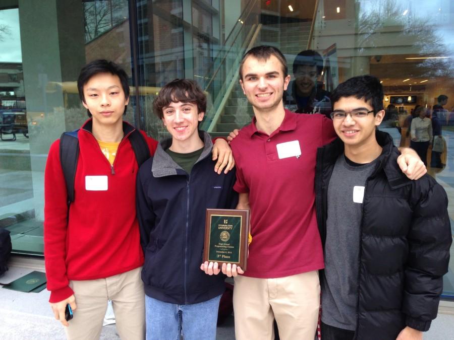 Kevin Jiang, Michael Colavita, Michael Gillett, and Alok Puranik (from left to right), standing with their 3rd place plaque after the competition 