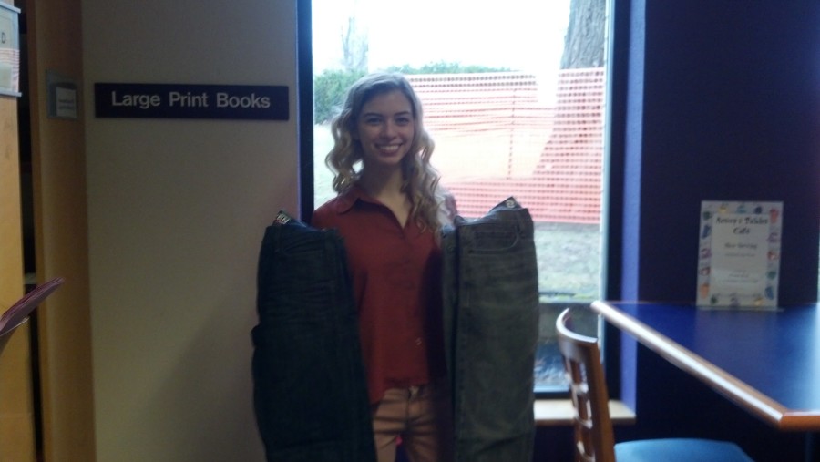 Jenna posing with some of her donated jeans