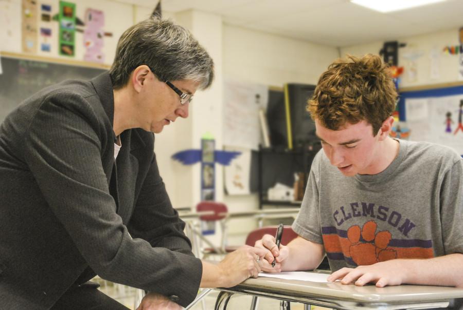 Janet Keirstead assisting a student