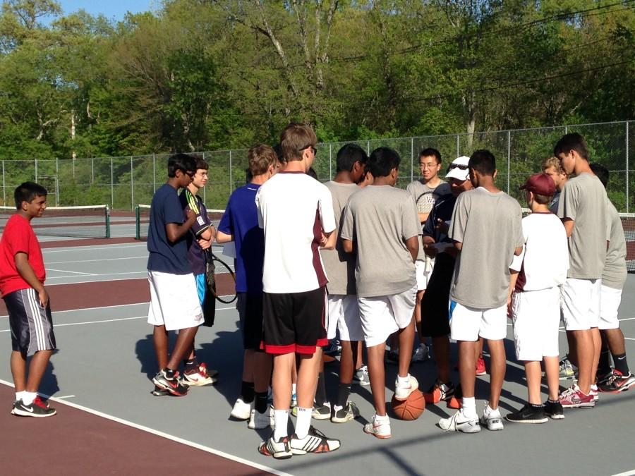 The team meets together after their loss to look forward to their next game and discuss what went wrong on the court.