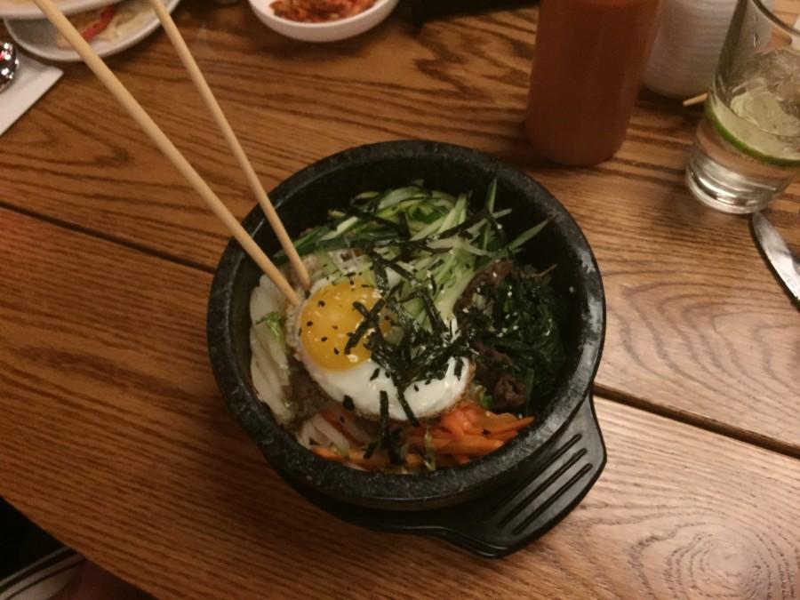 The bibimbap, a traditional Korean dish served with beautiful presentation and equally commendable taste.
