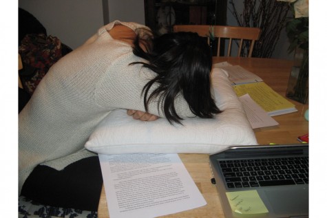 A student is overwhelmed with balancing school work and sleep