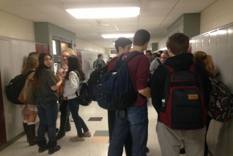 Students spend the new ten minute break talking with their friends in the hallways to reduce stress. 