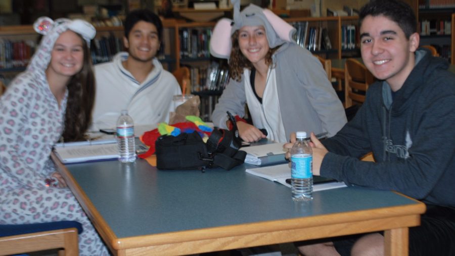 A group of students studying hard in their pajamas!