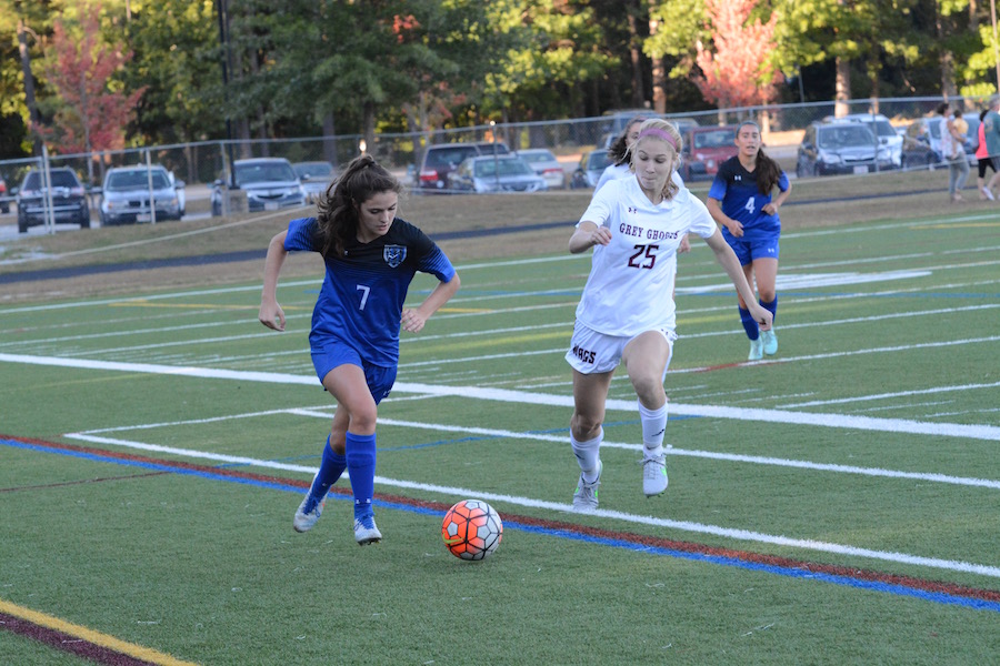 In the games second half, striker Katherine Pawlak sprung forward, running toward the ball to take possession of it.