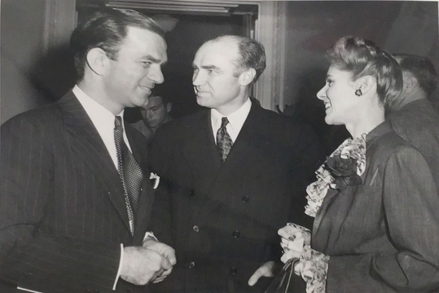 Clare Boothe Luce and Senator Fulbright, conversing at a party.