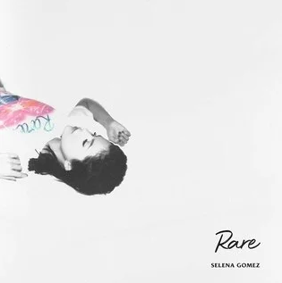 The cover art features Selena Gomez laying down in a t-shirt on a white background.