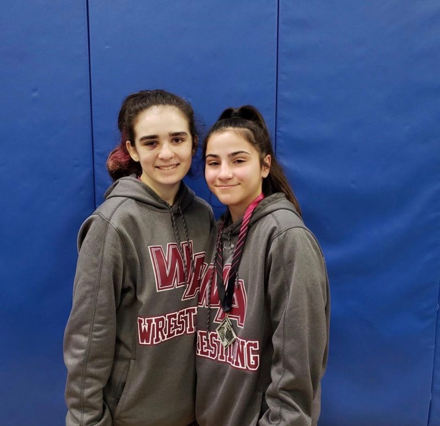 Junior Gianna Pannese (left) and freshmen Giselle Piedrahita (right) smiling for a picture after a competition. 