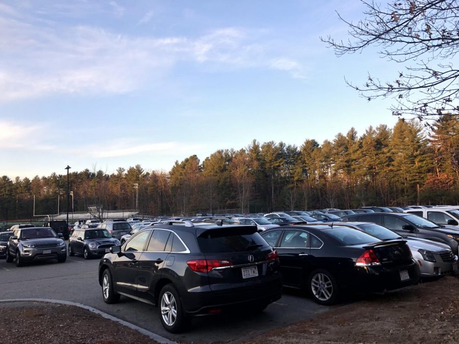 Students cars parking in the parking lot.
