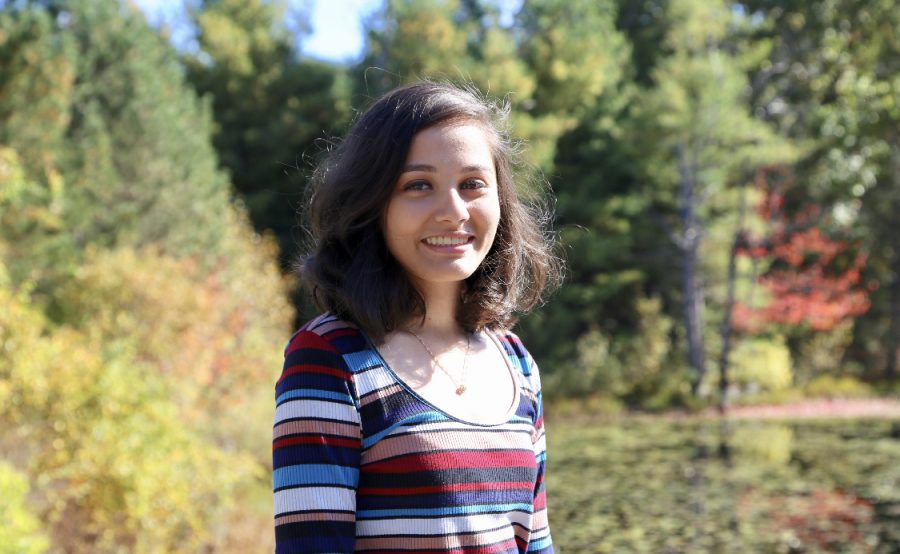 Shivangi Ranjan smiles brightly for her senior picture in the beautiful fall environment of New England, an opportunity she wont have in California at UCLA.