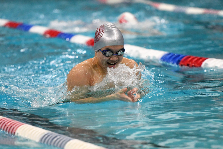 Bryce Fan swims breaststroke.