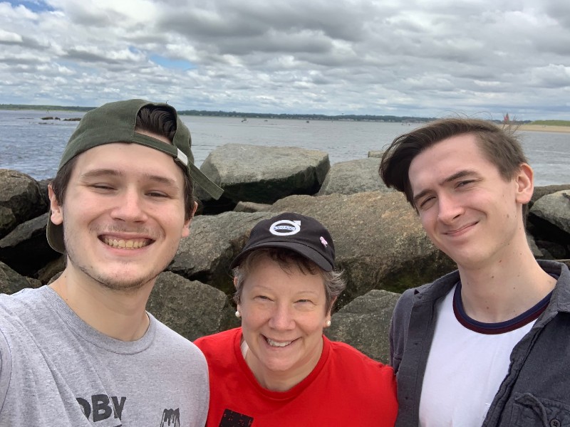 Profe Morris by the sea with her sons
