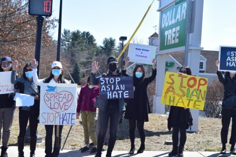 Westford residents protest on Boston Road in anti-Asian Hate Rally after Atlanta spa shooting.