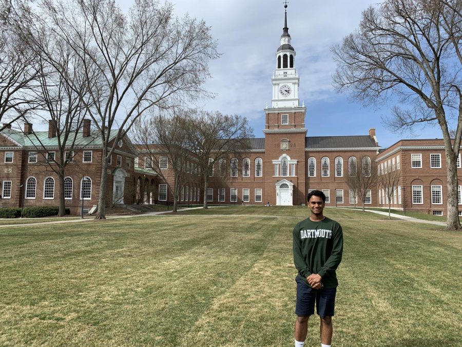 Senior Arpit Rao poses in front of Dartmouth College, where he will his education after high school.
