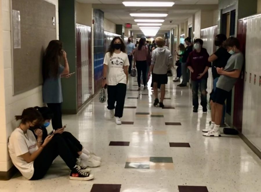 The students navigate the halls during their passing time, trying to get to their next block. 