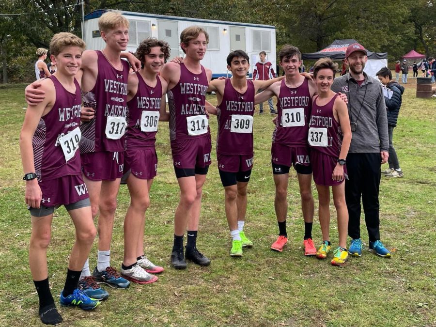 WA Boys Cross Country poses after winning the DCL Championship. They will look to add to their accomplishments this season at the state meet on Saturday. Runners pose from left to right (Davis Haines, Jack Graffeo, Paul Bergeron, Zachary Freyman, Anthony Chiappetta, Austin DeSisto, Adam Wedlake, and Coach Scott Hafferkamp).