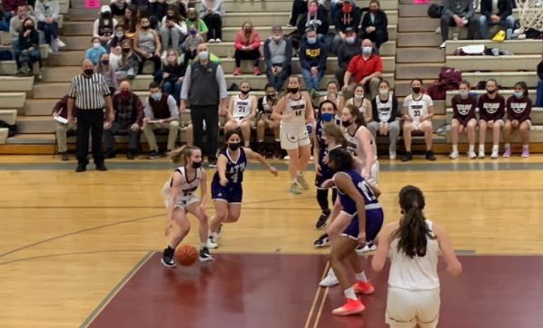 Westford Academy girls basketball wins against Boston-Latin, advancing through the state tourney.
