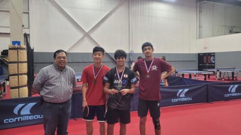 Right to left: Chhabra, Ajikutira, and Liu stand with their trophy after winning states.