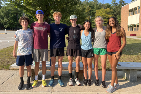 WA Cross Countrys 2022 senior captains (from left to right) Cam Douglas, Owen Schultz, Dan Ottesen, Austin DeSisto, Alison Chen, Kaitlyn Walpole, and Sharayu Tekade smile for a picture after practice. 