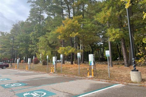 Electric vehicle chargers at Westford Academy faculty parking lot.