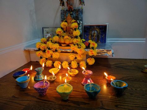 Dozens of diyas (oil lamps) are lit up in preparation for Diwali prayer and celebration. 
