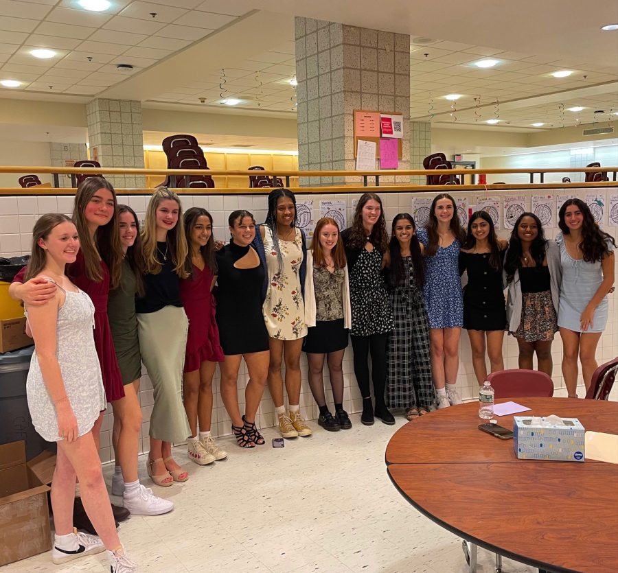 The WA Girls Varsity Volleyball team smiles for a picture at their end-of-season banquet. 