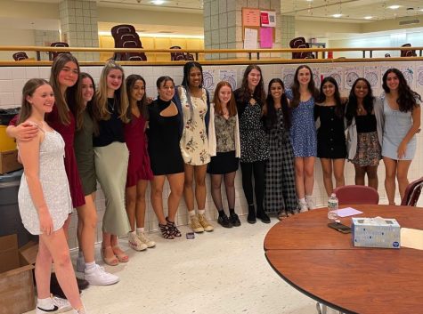 The WA Girls Varsity Volleyball team smiles for a picture at their end-of-season banquet. 
