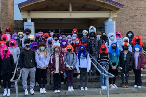 Wig-wearing students stand outside the entrance of WA during the first Wig Out in 2021.
