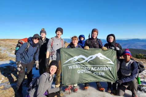 The Outing Club pictured at the top of Mt. Moosilauke. From left to right: Cheri Fisher, Callie Bateson, senior Lindsay Eby, senior Ian Anderson, sophomore Anna Guzik, Sara Blomgren, sophomore Ethan Mandile, junior Megan Keefer and junior Aiden Carrasco