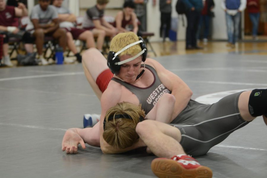 Senior Owen Boden puts an opponent from Londonderry in a headlock seconds before time runs out. 