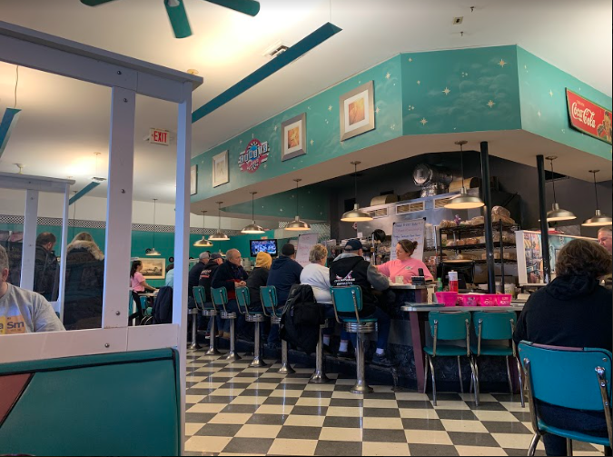 The 50s aesthetic atmosphere at Comets Diner.