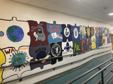 Walking through the halls of WA, students can admire this puzzle-piece mural that showcases a variety of the clubs WA offers. Some examples depicted include Beyond Words, The Ghostwriter, and Mock Trial