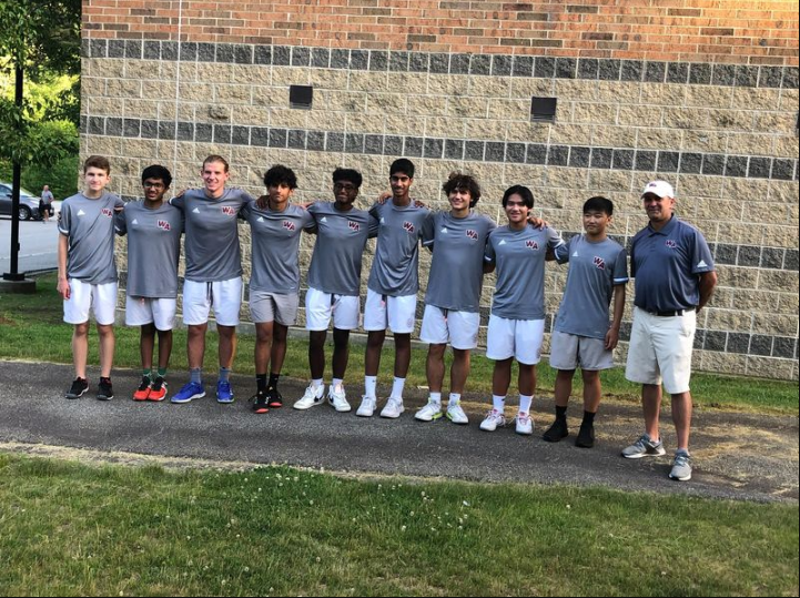 The Boys Tennis Team poses for picture.