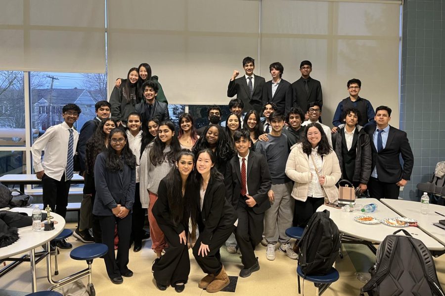 A most recent photo of the Speech and Debate team in the lead up to the state tournaments at the Needham March Merryness Tournament on March 18.