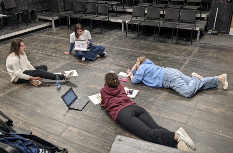 Masterson (far right) directs in the Black Box alongside sophomore Aubrie Rose (center), sophomore Ruby Davis (left), and sophomore DJ Maillet (far left).