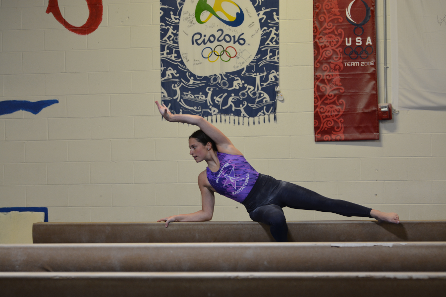 Maggie Murphy practices her skills in her home gym at Brestyans Gymnastics. 