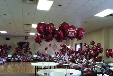 Balloons are inflated by volunteers at the Franco-American Club.