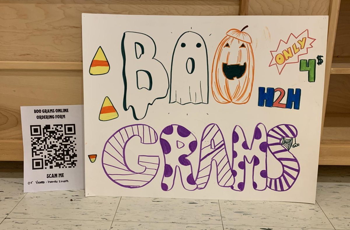 The poster created for the lunch table that the Hands to Haiti club members sold the Boo Grams at.