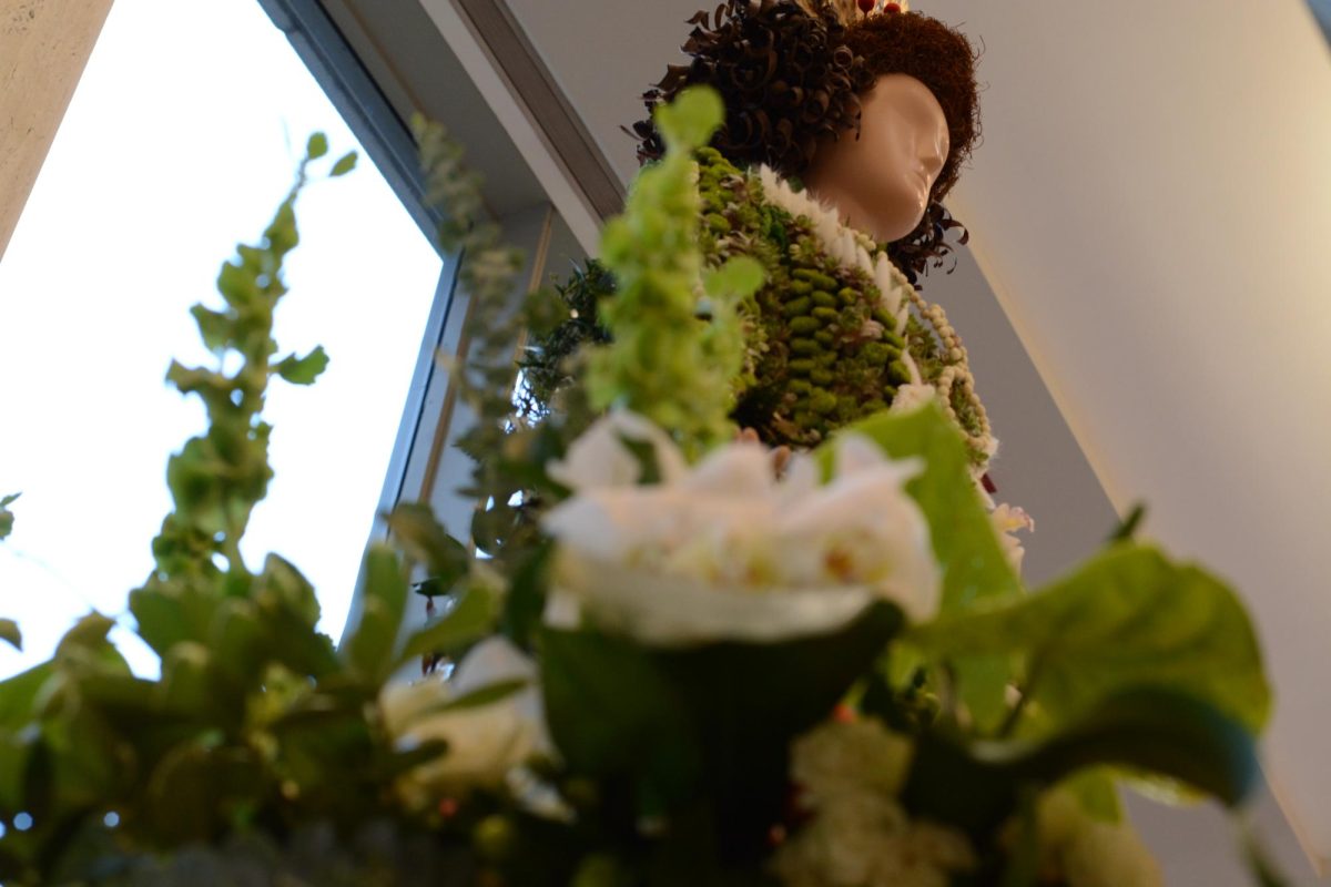 This floral artistic piece for Ireland expresses the culturally significant tradition of Irish dancing. Dancers wear the intricate costumes that this is modeled after.