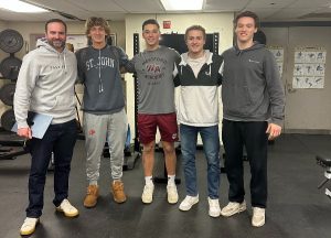 Coach Carpenter stands with his captains in the weight room before they work out. 
From left to right; Chris Carpenter, Nick Burns, Jack Nelken, Tyler Frazee, and Matt Mulhern