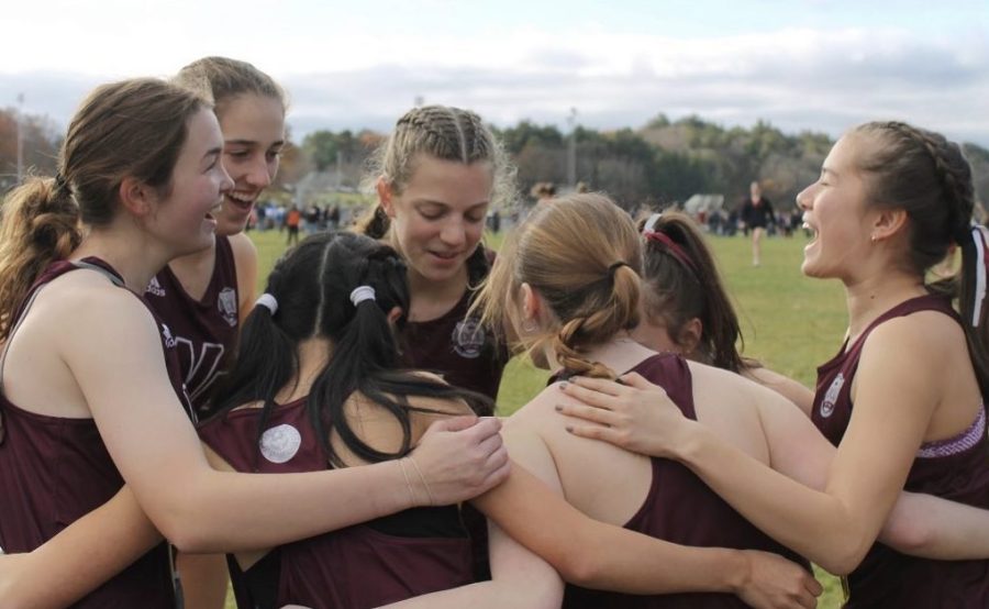 WA girls huddle up before their race to get themselves hyped up.  