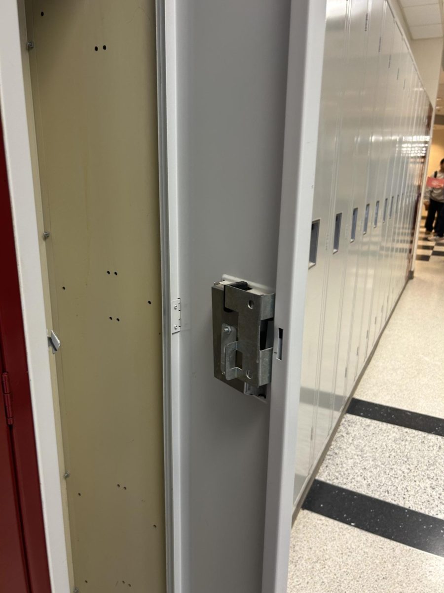 A row of empty and unused lockers during a passing period. 
