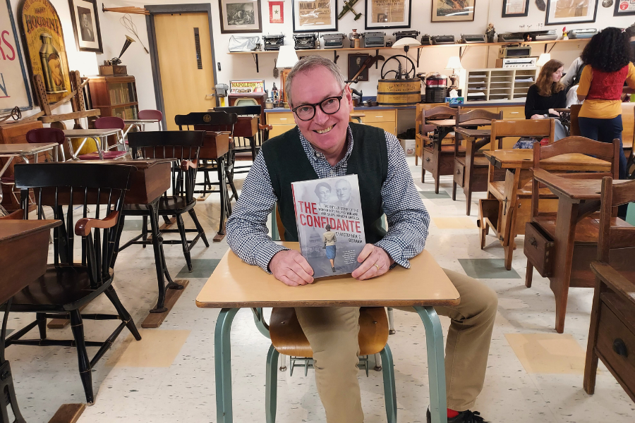 WA Modern American History teacher Christopher Gorham with a copy of his book The Confidante, which he just returned from a promotion tour for.