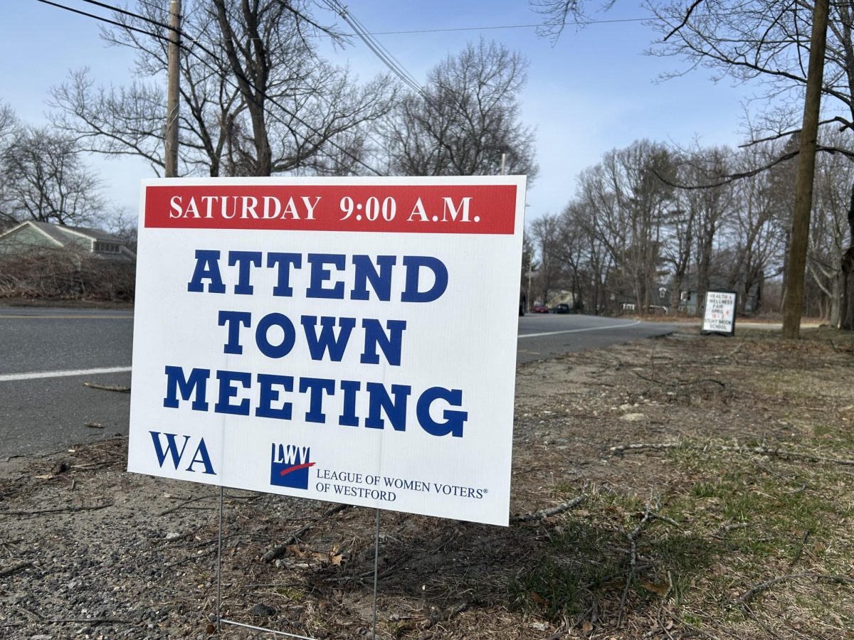 A yard sign encouraging town residents to attend the Annual Town Meeting scheduled for March 23rd.
