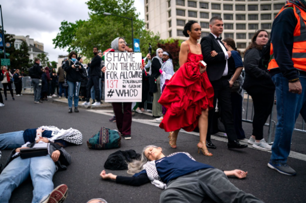 Attendees arrive at the Annual White House Correspondents dinner and ignore Pro-Palestinian protests. 