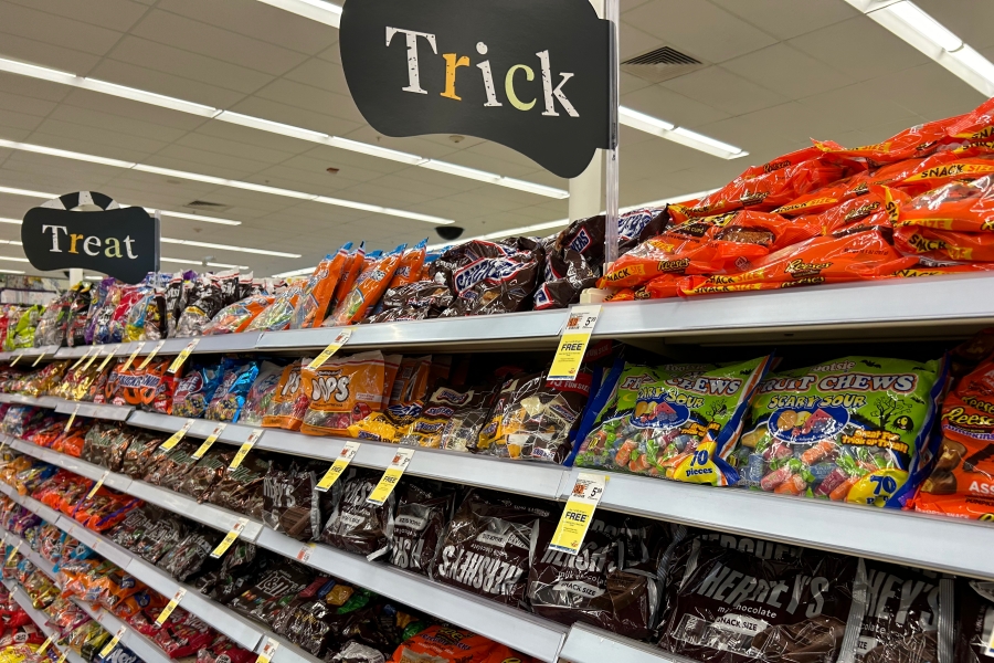 Rows of candy line shelves, ready for the Halloween season.